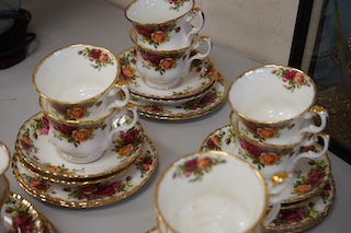 A Royal Albert Old Country Roses part tea set comprising twelve trios, a two tier cake stand, sugar bowl and cream jug. Condition - good